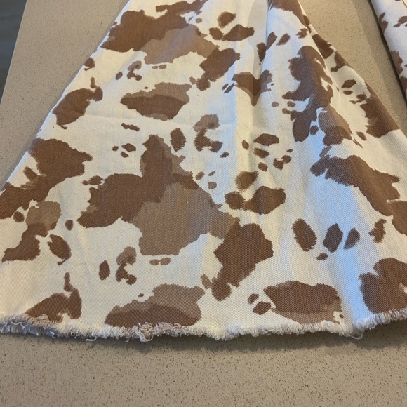 Altar'd State Brown and Cream Cow Patterned Flare Bell Bottom Pants - Picture 4 of 8